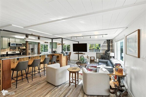 Living area - Once a 1950s Alaska Railroad Section House, this unique home blends modern comfort with vintage soul (Anchorage)