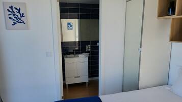 Desk, blackout curtains, soundproofing, iron/ironing board
