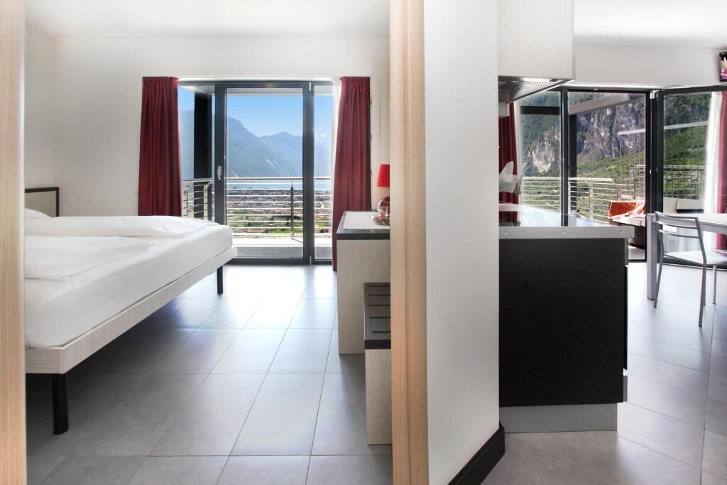 Appartamento, balcone, vista lago | Cassaforte in camera, Wi-Fi gratuito