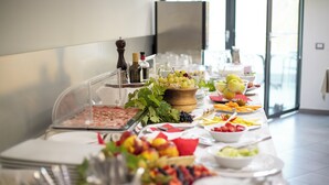 A buffet table with various food items and condiments. - Acetaia del Balsamico Trentino (Tenno)