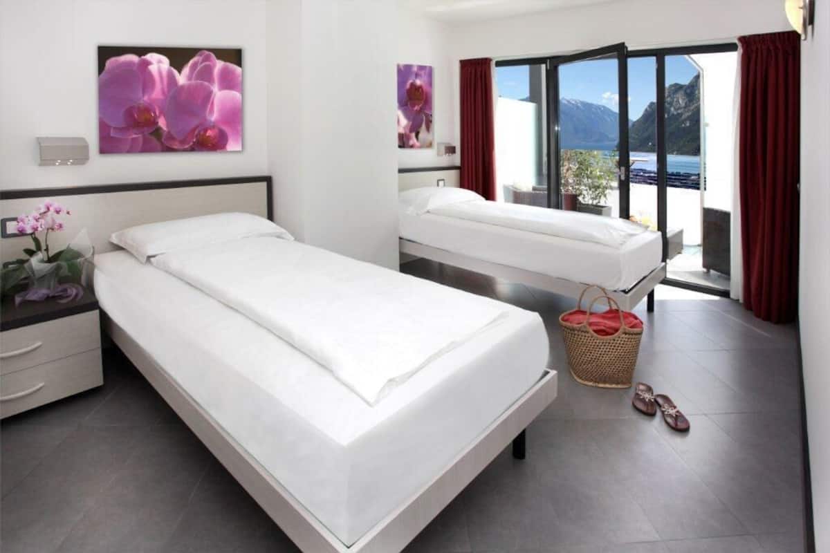 Twin Room, Lake View | In-room safe, blackout curtains, cots/infant beds, free WiFi