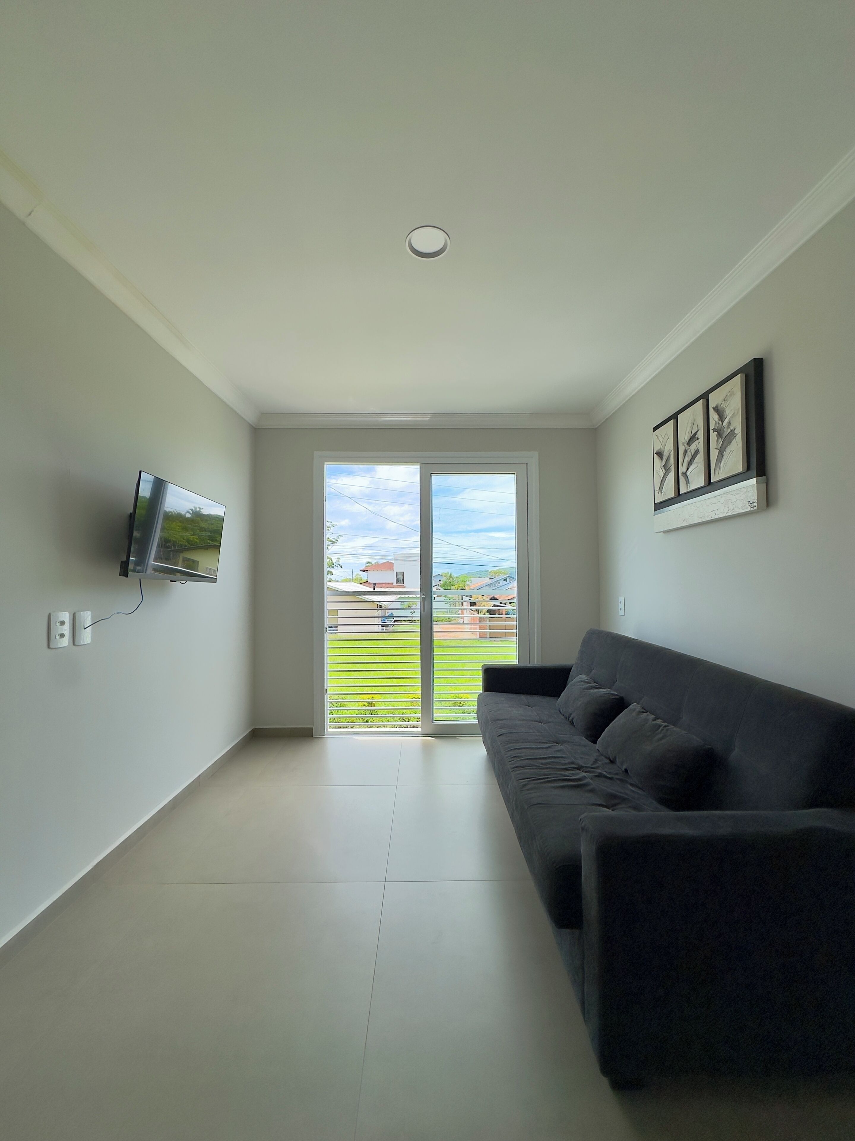 Standard Apartment, Sea View | Living area | 32-inch Smart TV with digital channels