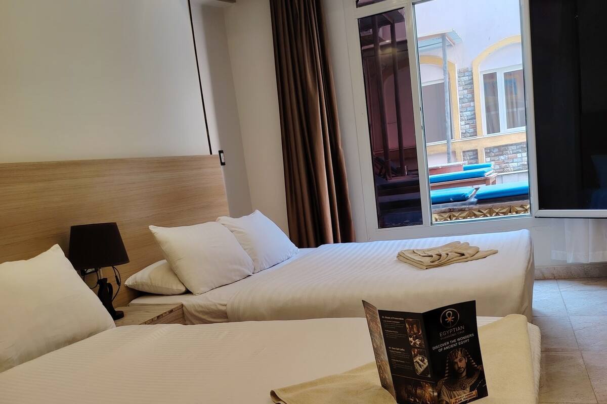 Comfort Double Room, Pool View | Laptop workspace, blackout drapes, free WiFi