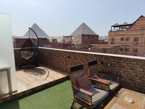Outdoor dining - Egypptian pharaonic cave2 &spa (Nazlit el sman)