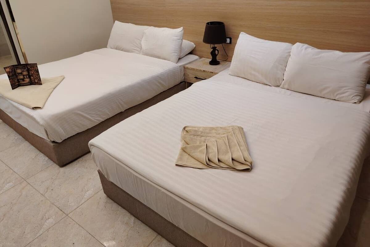 Comfort Triple Room, Desert View | Laptop workspace, blackout drapes, free WiFi