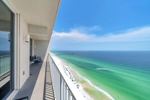 A balcony with a view of a beach and ocean. - Tidewater 2315 (Panama City Beach)