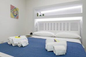 Comfort Room, Park View | In-room safe, desk, laptop workspace, iron/ironing board - ELORO - Guest Houses (NOTO)