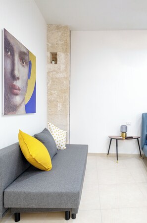 Habitación Deluxe, vista al parque | Área de sala de estar