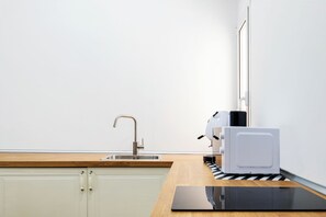 Habitación Deluxe, vista al parque | Cocina privada