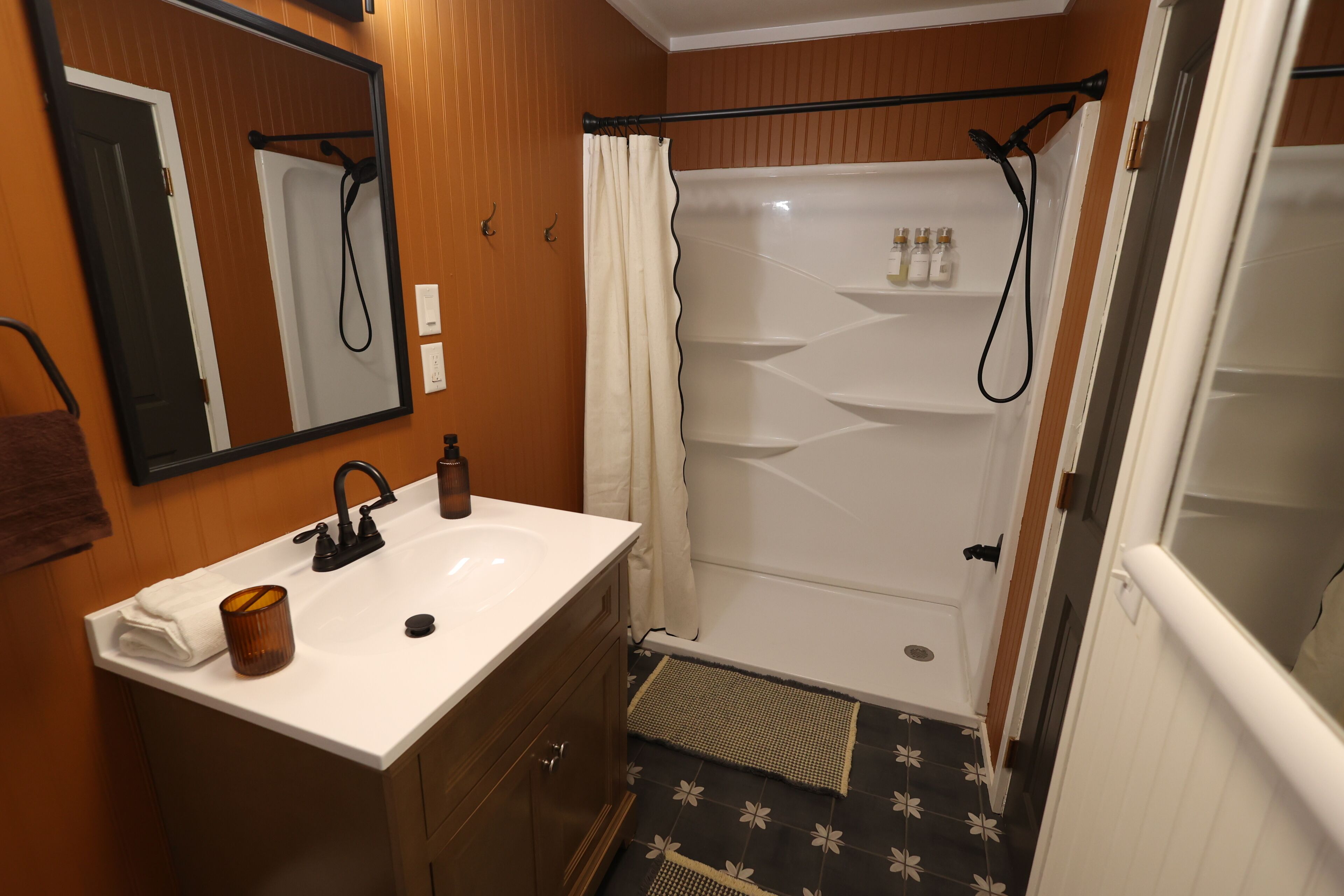 Shower, towels, soap, toilet paper