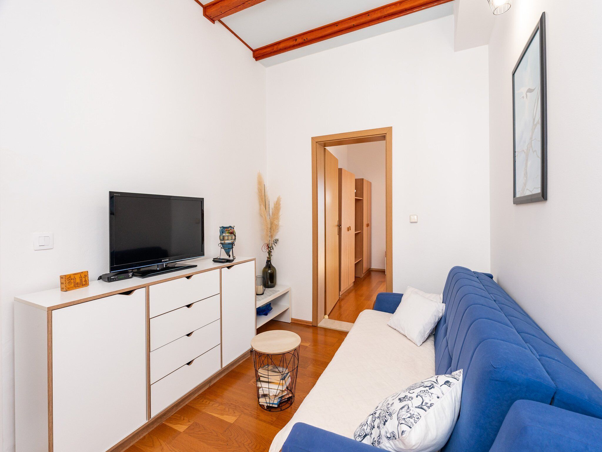 Apartment (Two Bedroom Apartment with Terrace) | Living room | 32-inch flat-screen TV with cable channels