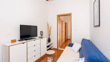 Apartment (Two Bedroom Apartment with Terrace) | Living room | 32-inch flat-screen TV with cable channels