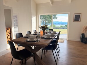 Dining - Modern, stylish, 3-bdr home, large spaces with stunning ocean & mountain views (Quathiaski Cove)