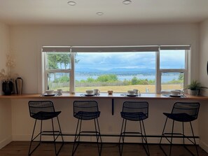 Dining - Modern, stylish, 3-bdr home, large spaces with stunning ocean & mountain views (Quathiaski Cove)