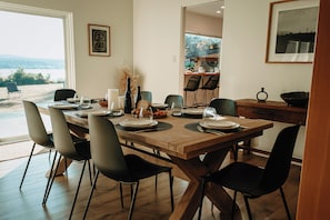 Dining - Modern, stylish, 3-bdr home, large spaces with stunning ocean & mountain views (Quathiaski Cove)