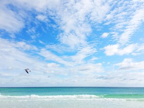 A beach with clear skies and ocean waves. - Summit at Tops'l 612- Miramar Memories (Miramar Beach)