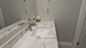 Hair dryer, towels, soap, toilet paper