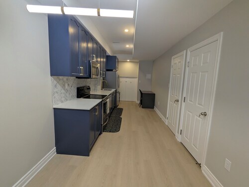 Modern Designer Suite — Minutes to Thermëa Spa & Highways 407, 401 and GO