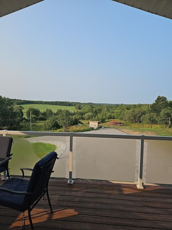 Property grounds. Beautiful modern country home with spacious Deck and interior.