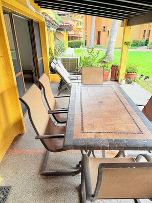 Outdoor dining - 4-bedroom family condo with 8 pools and a private beach (Puerto Vallarta)