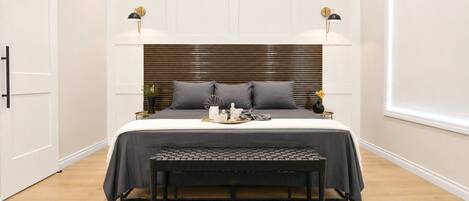 Une chambre à coucher moderne, avec un lit, des lampes de chevet, une table de chevet, un banc et une grande fenêtre.