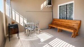 Comfort House, 2 Bedrooms, Air conditioning, Courtyard View | Outdoor dining - Casa Conforto da Penha - Penha SC - (Penha)