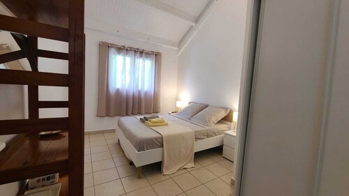 Two-bedroom apartment with a garden, in a quiet complex with a pool