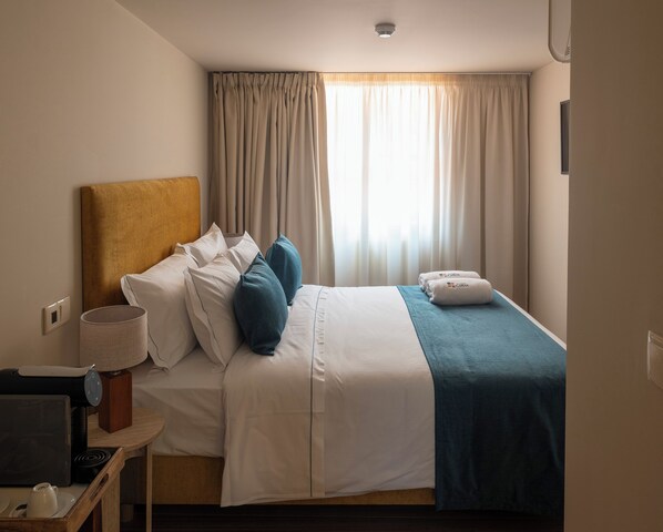 Habitación doble Confort, vista a la ciudad | Wifi gratis 