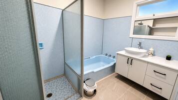 Shower, hair dryer, towels