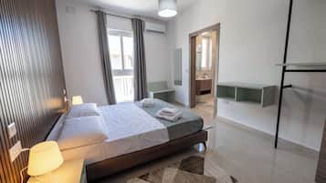 3 habitaciones, tabla de planchar con plancha, wifi y ropa de cama