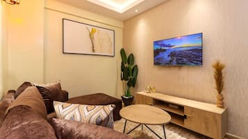 55-inch Smart TV with cable channels, Netflix, first-run films