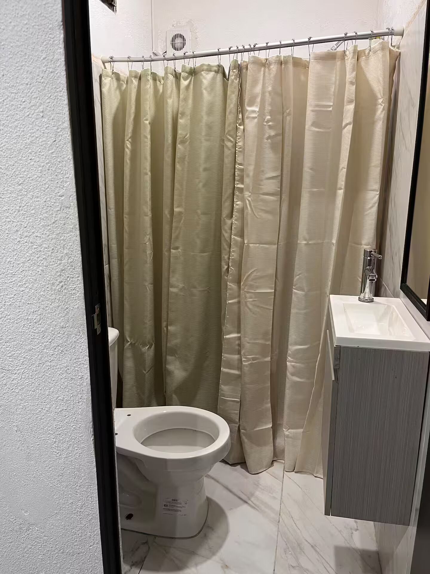 Shower, hair dryer, towels, toilet paper