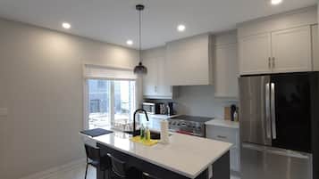 Coffee/tea maker, fridge, microwave, oven