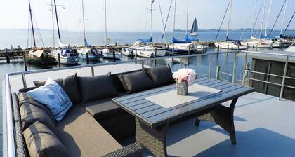 Fjord LaFee Houseboat with Rooftop Terrace in Flensburg