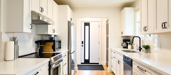 The Redbrick Residence - 3 bedroom main floor home with AC + covered patio