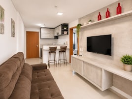 Apartamento standard | Área de estar | TV de tela plana