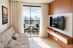 Apartamento conforto | Área de estar | TV de tela plana