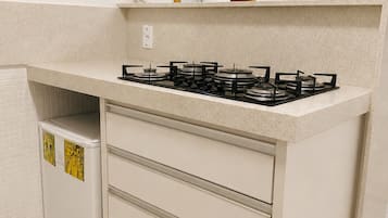 Traditional Apartment | Private kitchen | Fridge, microwave, stovetop, cookware/dishes/utensils