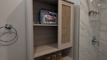 Hair dryer, towels, soap, toilet paper