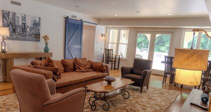 Experience the New Amsterdam Nook, a modern 2-bed, 1-bath retreat in Mechanicsville. This European-inspired home features a full kitchen, private pool, hot tub, and playground. Comfortably accommodates up to 4 people.