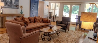 Experience the New Amsterdam Nook, a modern 2-bed, 1-bath retreat in Mechanicsville. This European-inspired home features a full kitchen, private pool, hot tub, and playground. Comfortably accommodates up to 4 people.