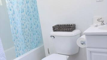 Hair dryer, towels, soap, toilet paper
