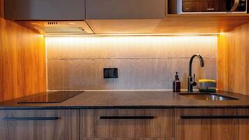 Fridge, microwave, stovetop, coffee/tea maker