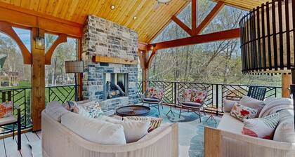 Tranquil Lakefront Retreat With hot Tub, Screened Porch, Kayaks, and More