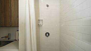 Shower, towels, soap, toilet paper