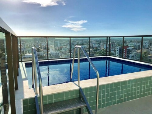 Cozy apartment in Olinda with pool and sunset view.