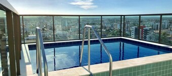 Cozy apartment in Olinda with pool and sunset view.