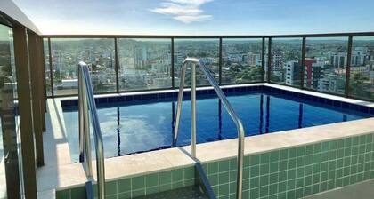 Cozy apartment in Olinda with pool and sunset view.
