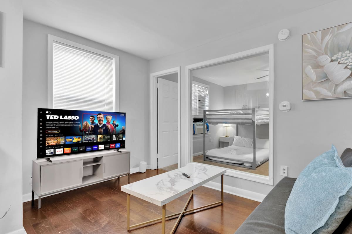 Apartment, 1 Bedroom | Living area | 55-inch Smart TV with digital channels