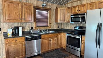 Coffee/tea maker, fridge, microwave, oven